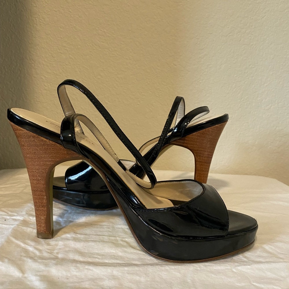 Exchange by Charles David black patent leather ankle strap heels.
